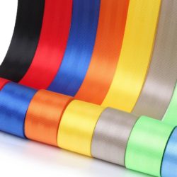 This picture shows harness webbing in many different colors.