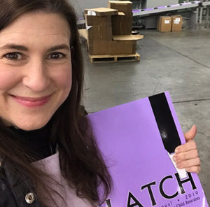 This is Denise Donaldson holding the 2019 LATCH Manual at the press; 2 of 2.
